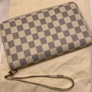 Woman LV wristlet